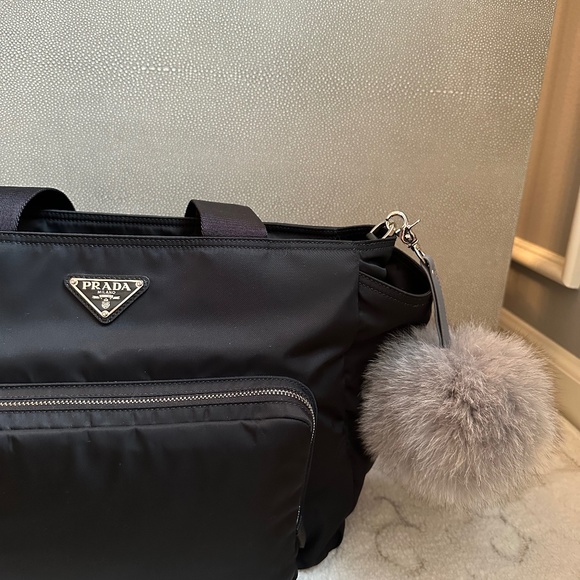 Real Fox Fur Pompom on genuine leather strap